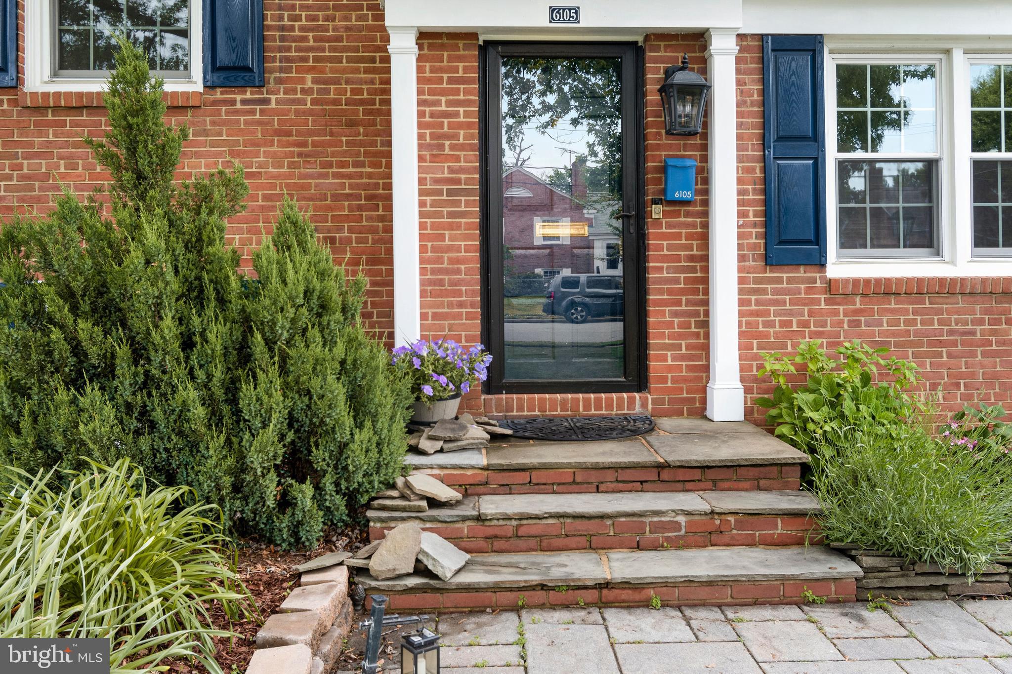 6105 Brandon Avenue Springfield, VA 22150 - Photo 5 of 45 Blooming perennial flower beds & slate walk
