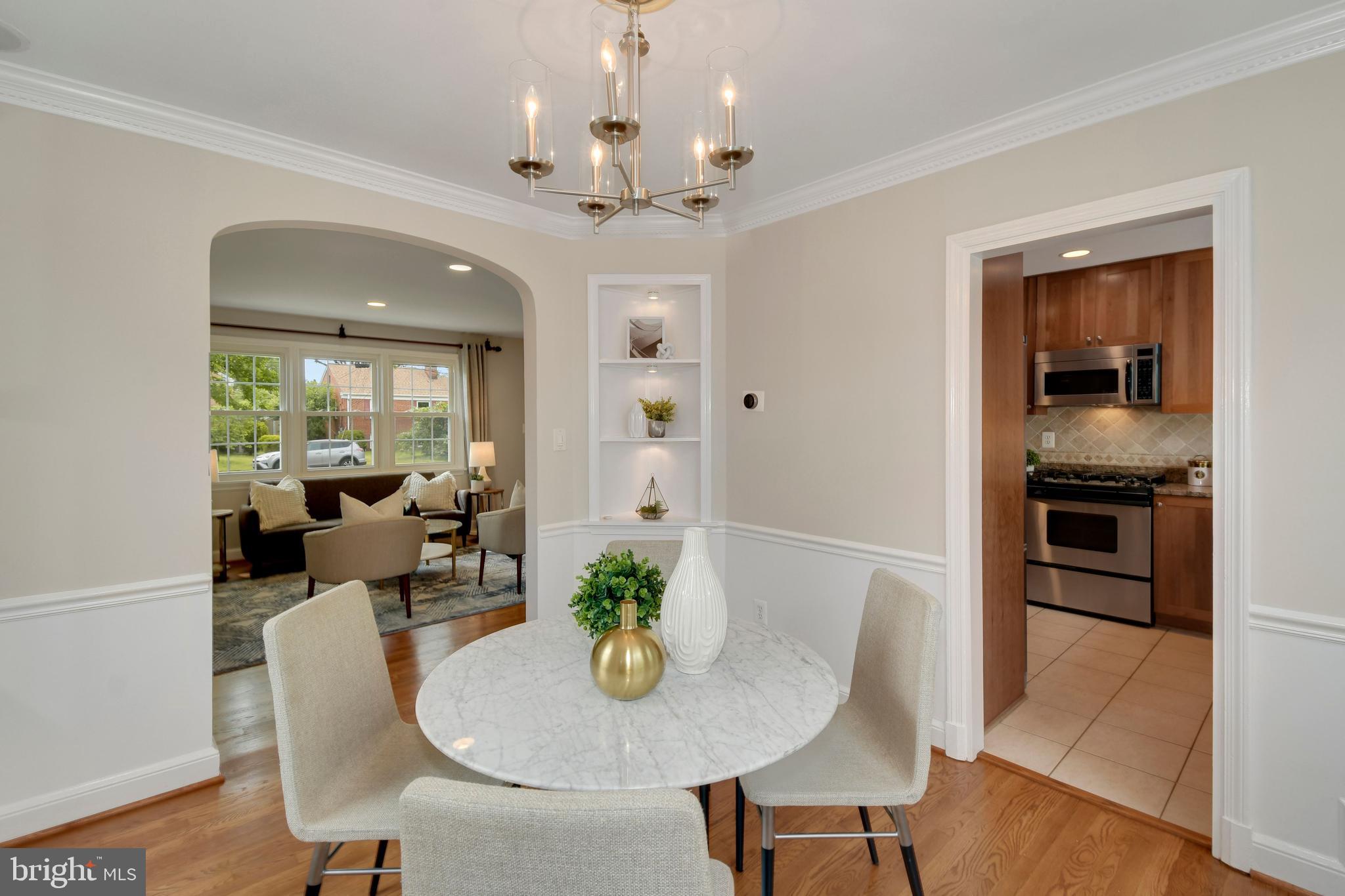 6105 Brandon Avenue Springfield, VA 22150 - Photo 8 of 45 Open plan , built-in display & crown molding