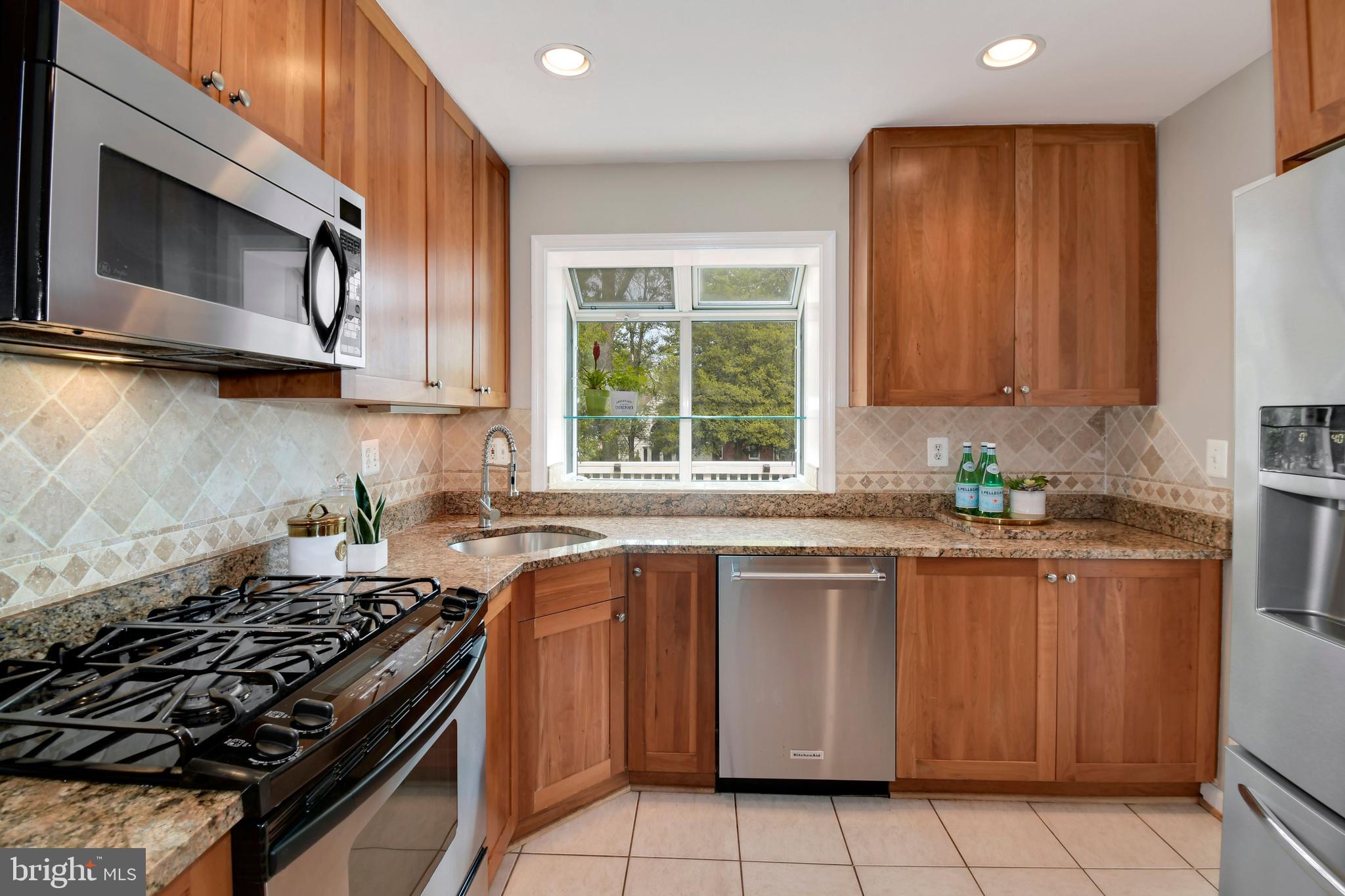 6105 Brandon Avenue Springfield, VA 22150 - Photo 10 of 45 Gourmet kitchen - custom cabinets & garden window