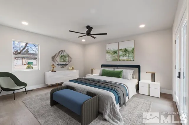 a bedroom with a bed furniture and window