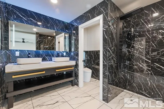 a view of living room kitchen and entryway