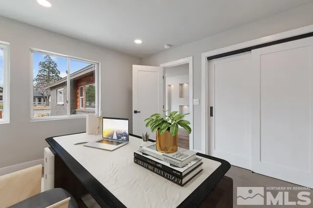 a living room with furniture and window