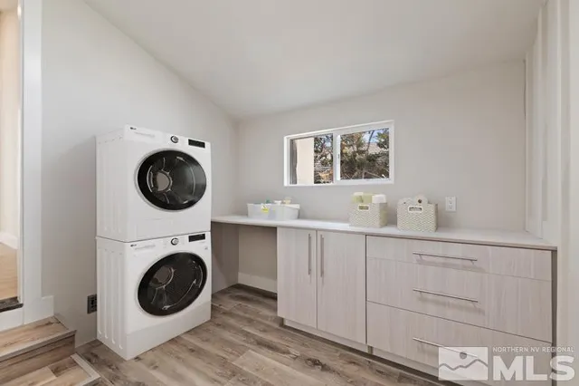 a view of living room with washer and dryer