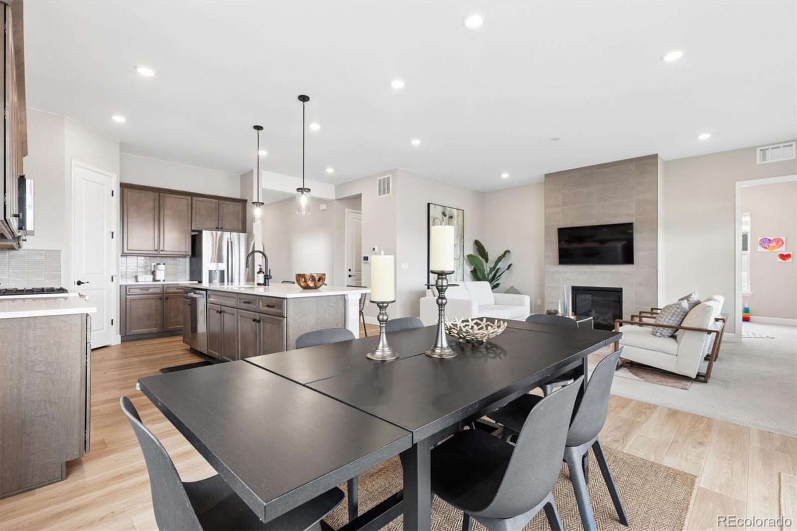 5980 South Platte Canyon Road Littleton, CO 80123 - Photo 17 of 50 a kitchen with a dining table chairs and view kitchen