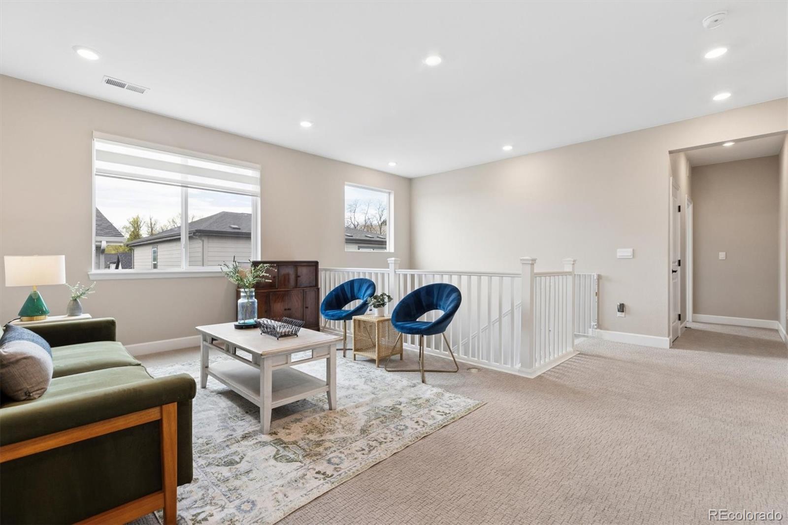 5980 South Platte Canyon Road Littleton, CO 80123 - Photo 25 of 50 a living room with furniture a window and a table