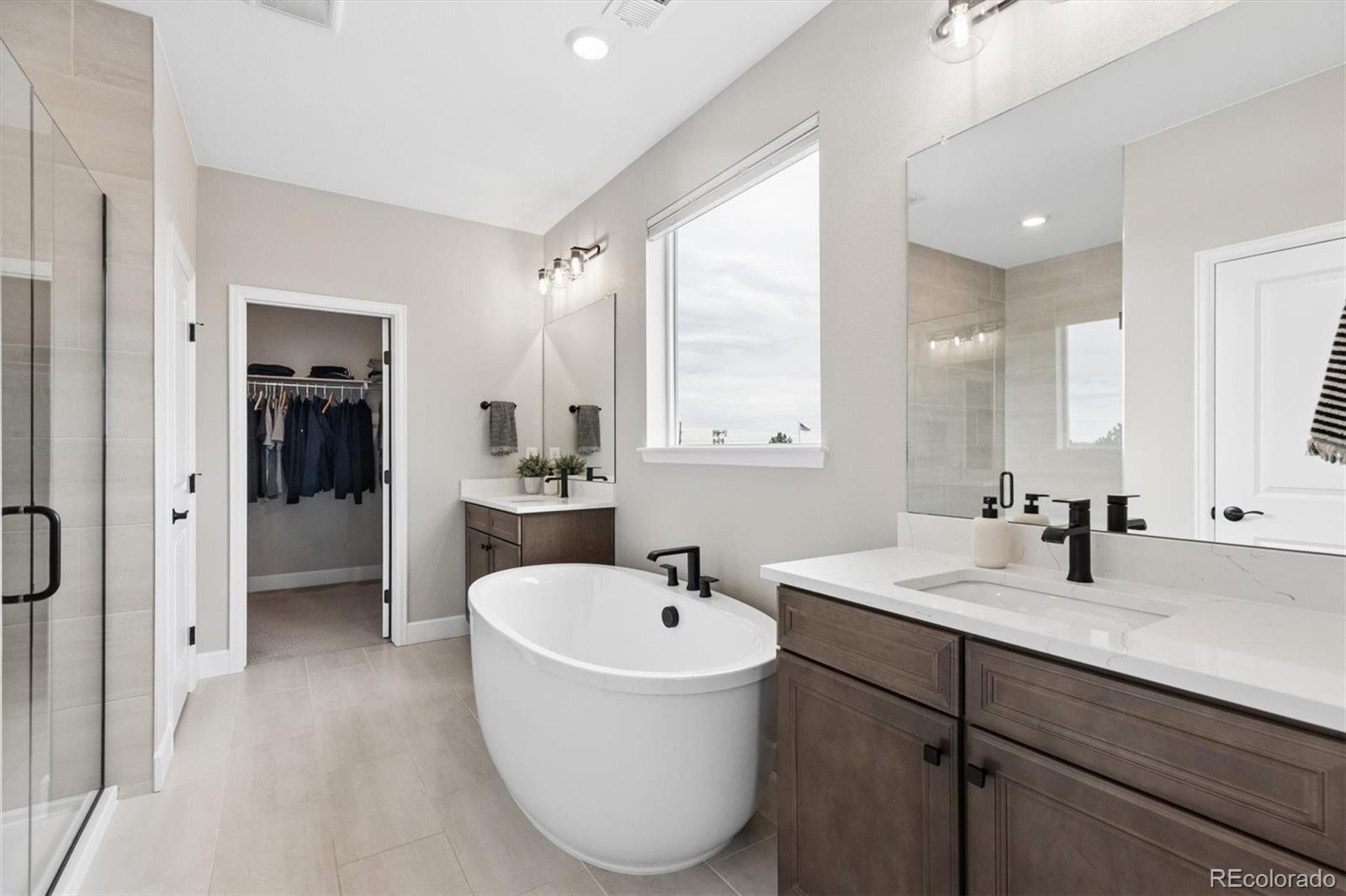 5980 South Platte Canyon Road Littleton, CO 80123 - Photo 28 of 50 a bathroom with a sink and a mirror