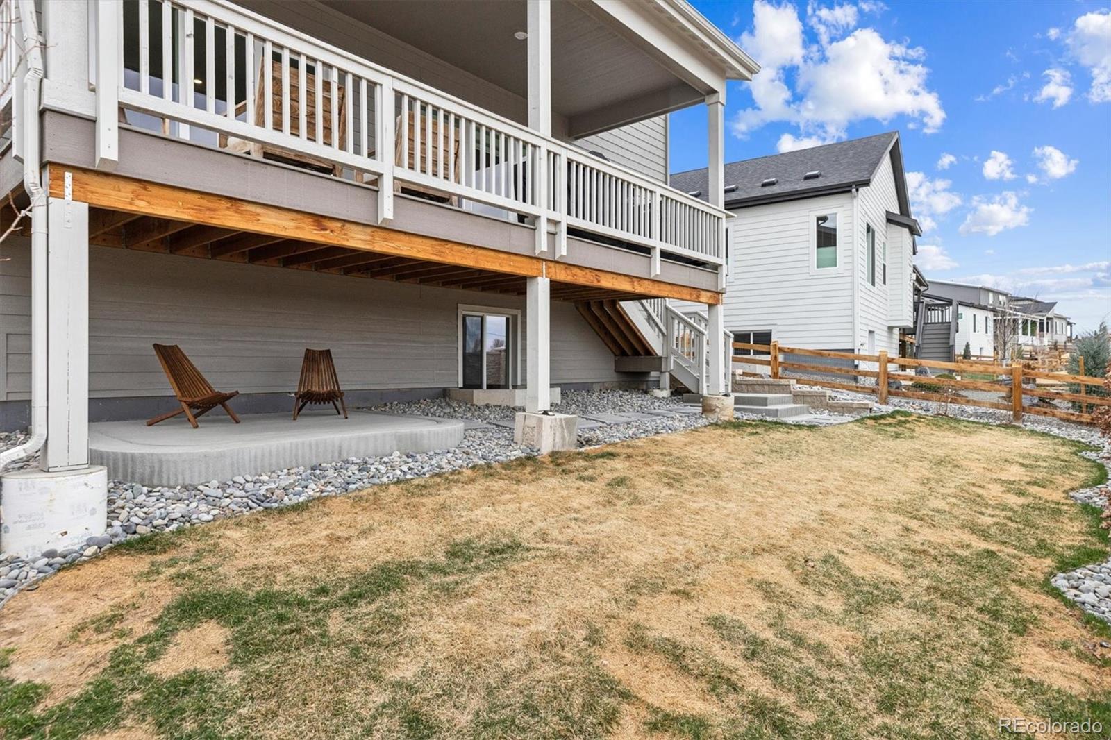 5980 South Platte Canyon Road Littleton, CO 80123 - Photo 42 of 50 a view of a house with backyard and deck