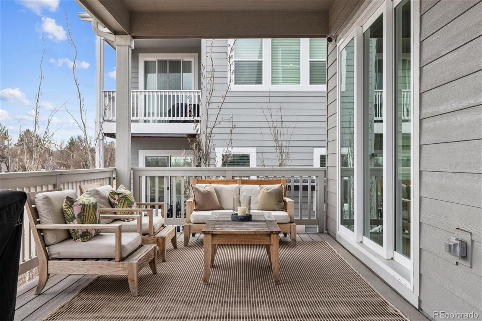5980 South Platte Canyon Road Littleton, CO 80123 - Photo 6 of 50 a balcony with furniture and next to a window