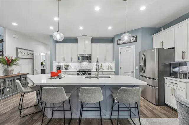 an aerial view of a house with a garden