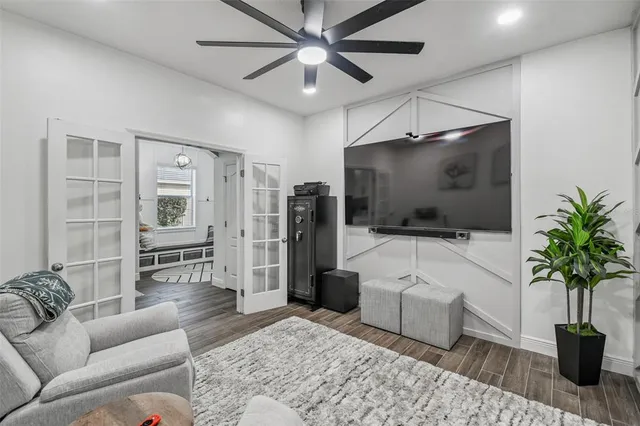 a dining room with kitchen island a table and chairs in it