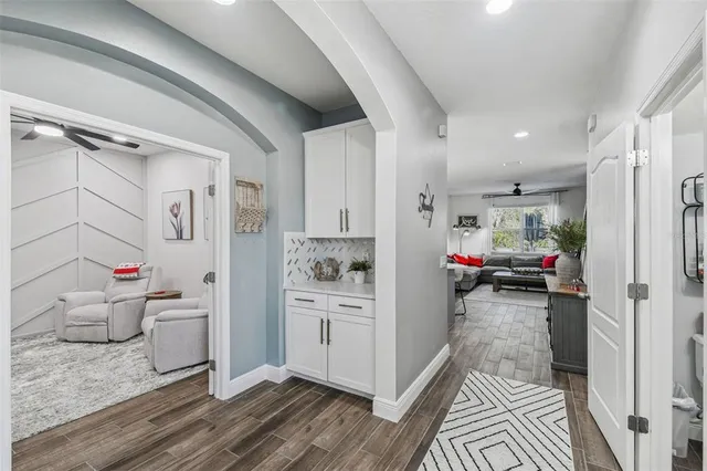 a spacious bedroom with a bed and a fireplace