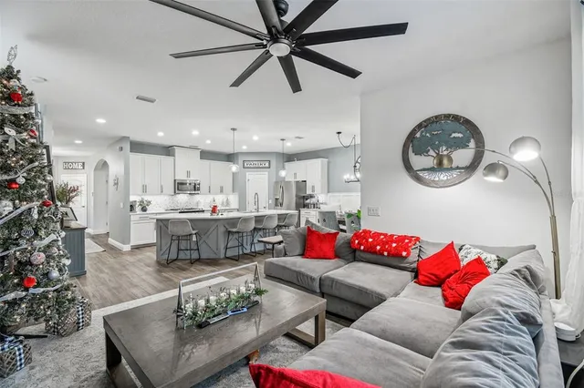 a bathroom with a double vanity sink toilet and a mirror