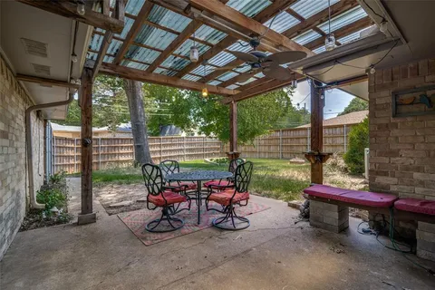 a sitting area with furniture and a bench
