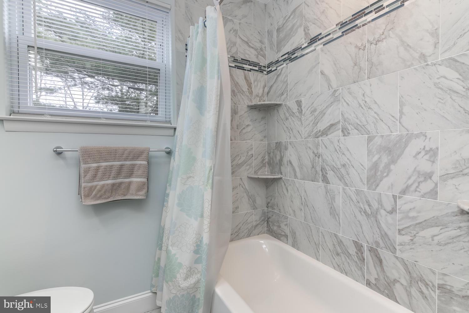 61 Colonial Road Havertown, PA 19083 - Photo 22 of 27 Tile Hall Bath