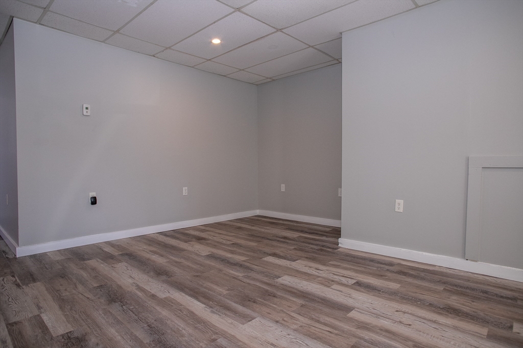 865 South Barre Road Barre, MA 01074 - Photo 15 of 34 a view of an empty room with wooden floor