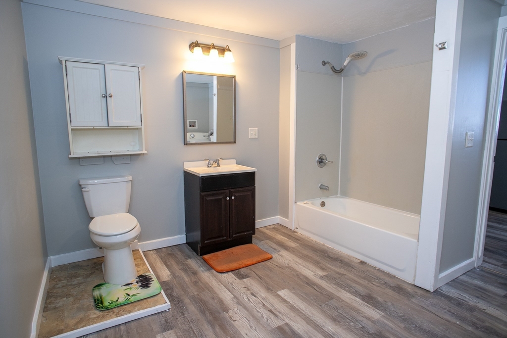 865 South Barre Road Barre, MA 01074 - Photo 24 of 34 a bathroom with a sink toilet and shower