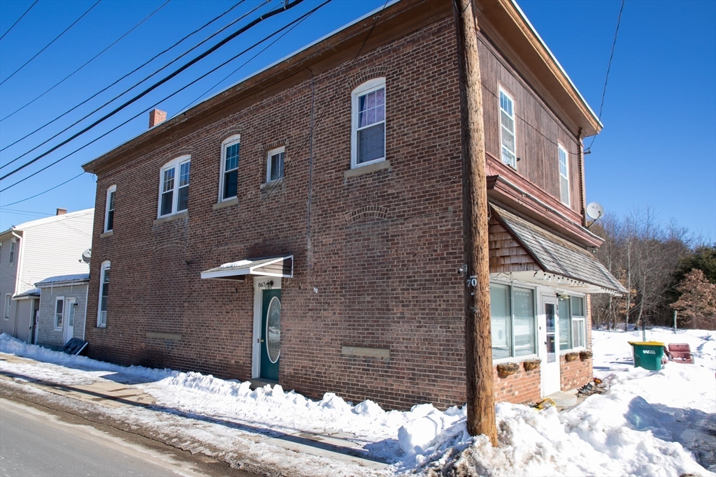 865 South Barre Road Barre, MA 01074 - Photo 3 of 34 a front view of a house with street