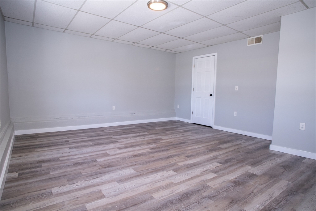 865 South Barre Road Barre, MA 01074 - Photo 31 of 34 a view of empty room with wooden floor