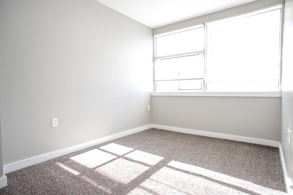 865 South Barre Road Barre, MA 01074 - Photo 8 of 34 an empty room with a window