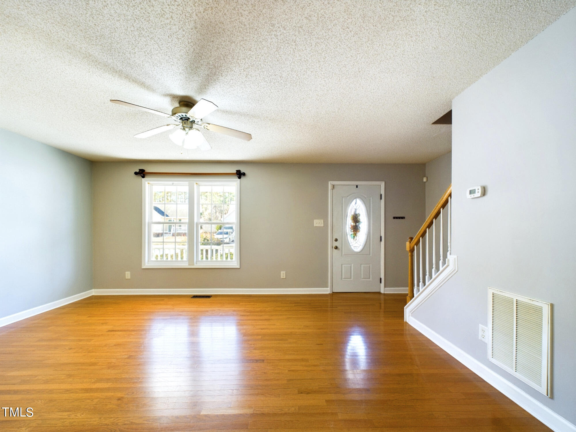 5653 Tealbrook Drive Raleigh, NC 27610 - Photo 3 of 30 Living Room/Den