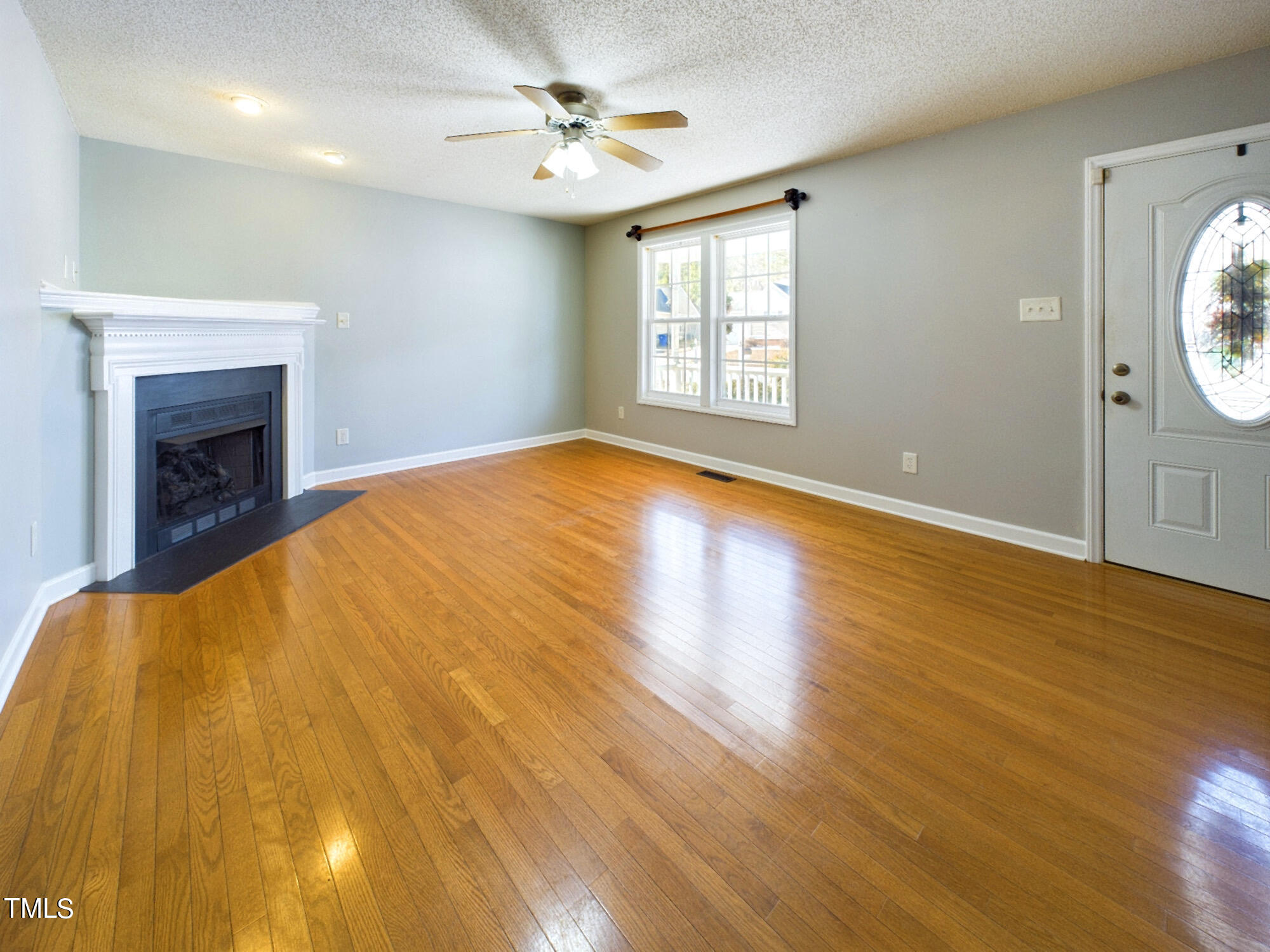 5653 Tealbrook Drive Raleigh, NC 27610 - Photo 4 of 30 Living Room/Den