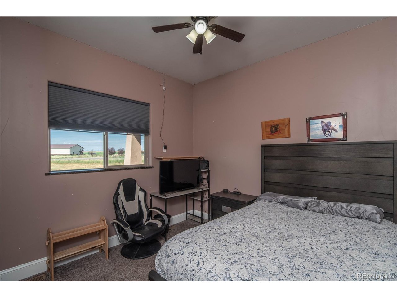 9368 41st Fort Fort Lupton, CO 80621 - Photo 28 of 44 a bedroom with a bed and a window