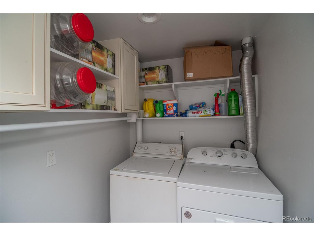 9368 41st Fort Fort Lupton, CO 80621 - Photo 35 of 44 a utility room with dryer washer and shoe rack