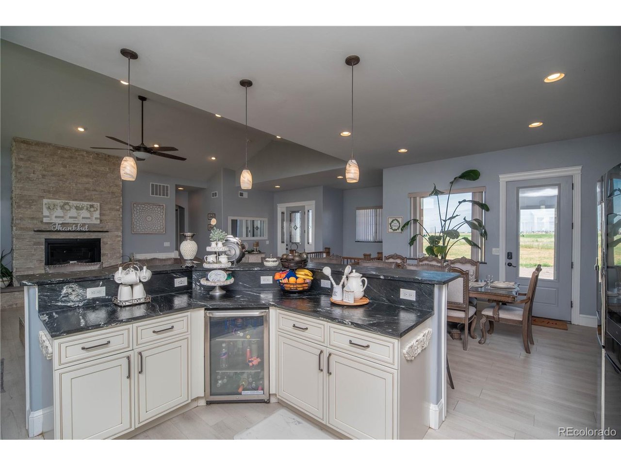9368 41st Fort Fort Lupton, CO 80621 - Photo 7 of 44 a kitchen with a counter space cabinets and appliances