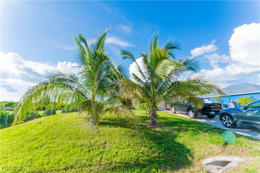 5134 Baron Street Lehigh Acres, FL 33971 - Photo 20 of 30 a view of swimming pool yard
