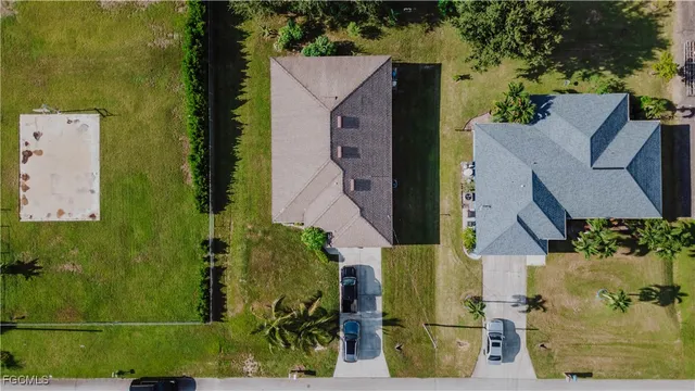an aerial view of a residential houses