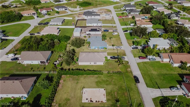an aerial view of residential building with outdoor space and pool