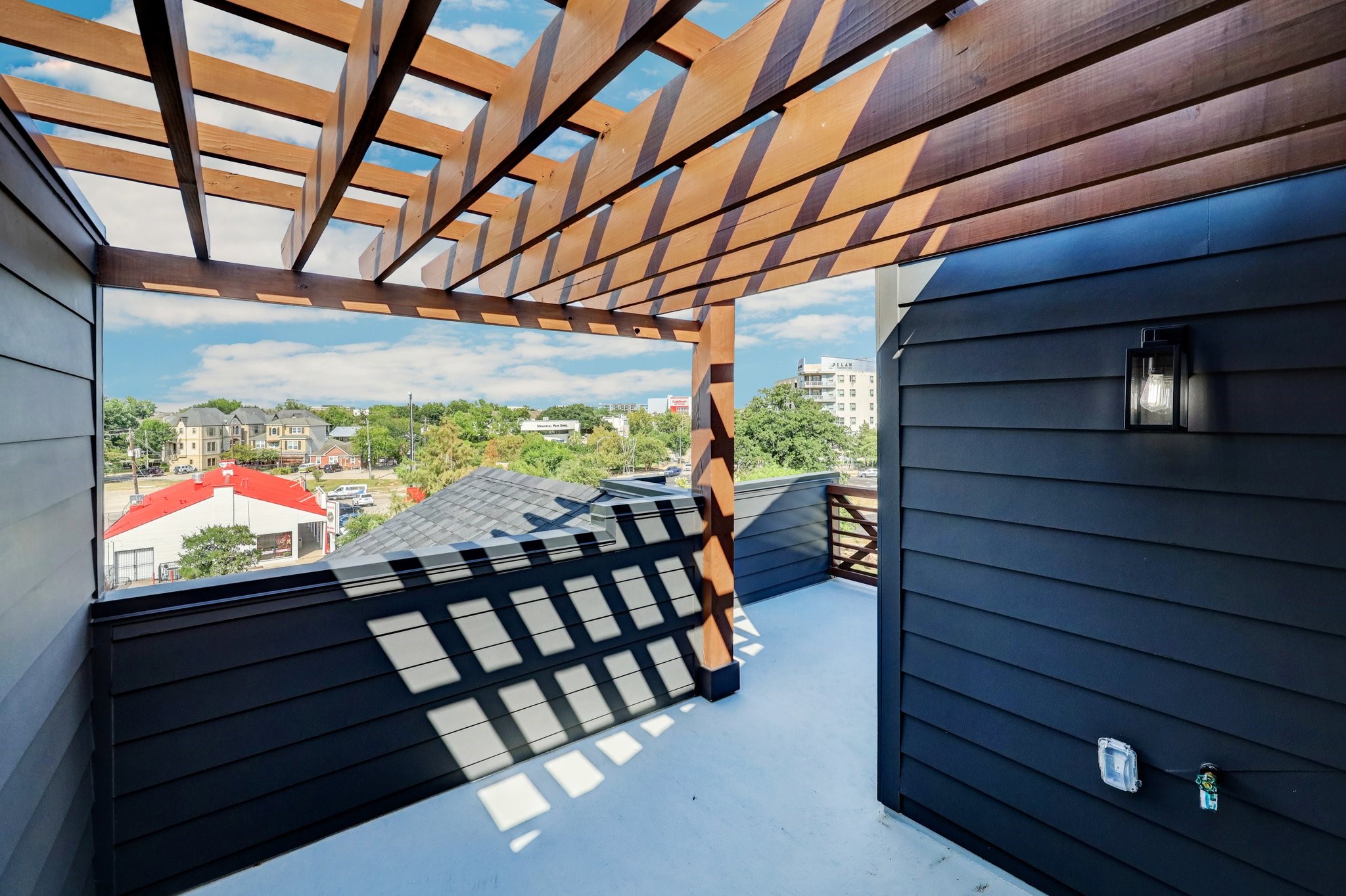 6209 Westcott Street Houston, TX 77007 - Photo 14 of 16 Wood trellis covered Roofttop terrace with gas and water access.