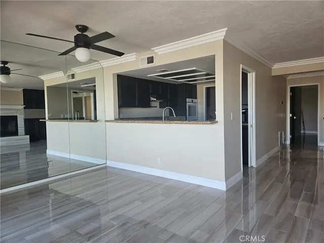 a view of a livingroom with wooden floor