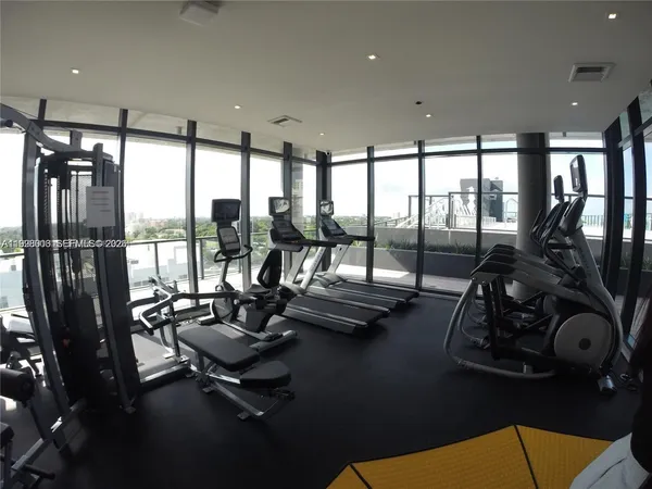a view of a room with gym equipment