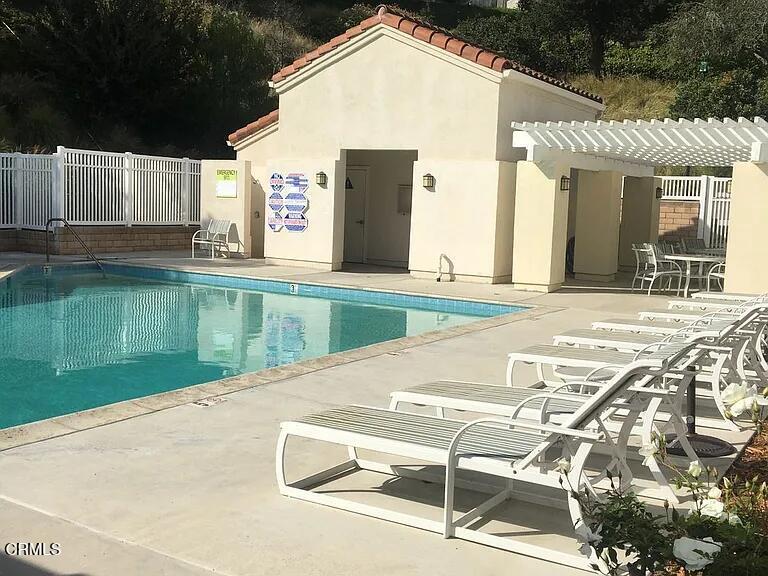 809 Vista Arriago Camarillo, CA 93012 - Photo 11 of 11 a view of a house with a backyard and a lake view