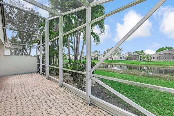a view of a porch and garden