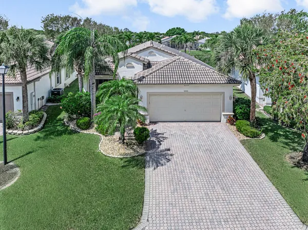 an aerial view of a houses with outdoor space and street view