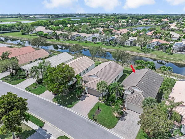 an aerial view of a house with a garden