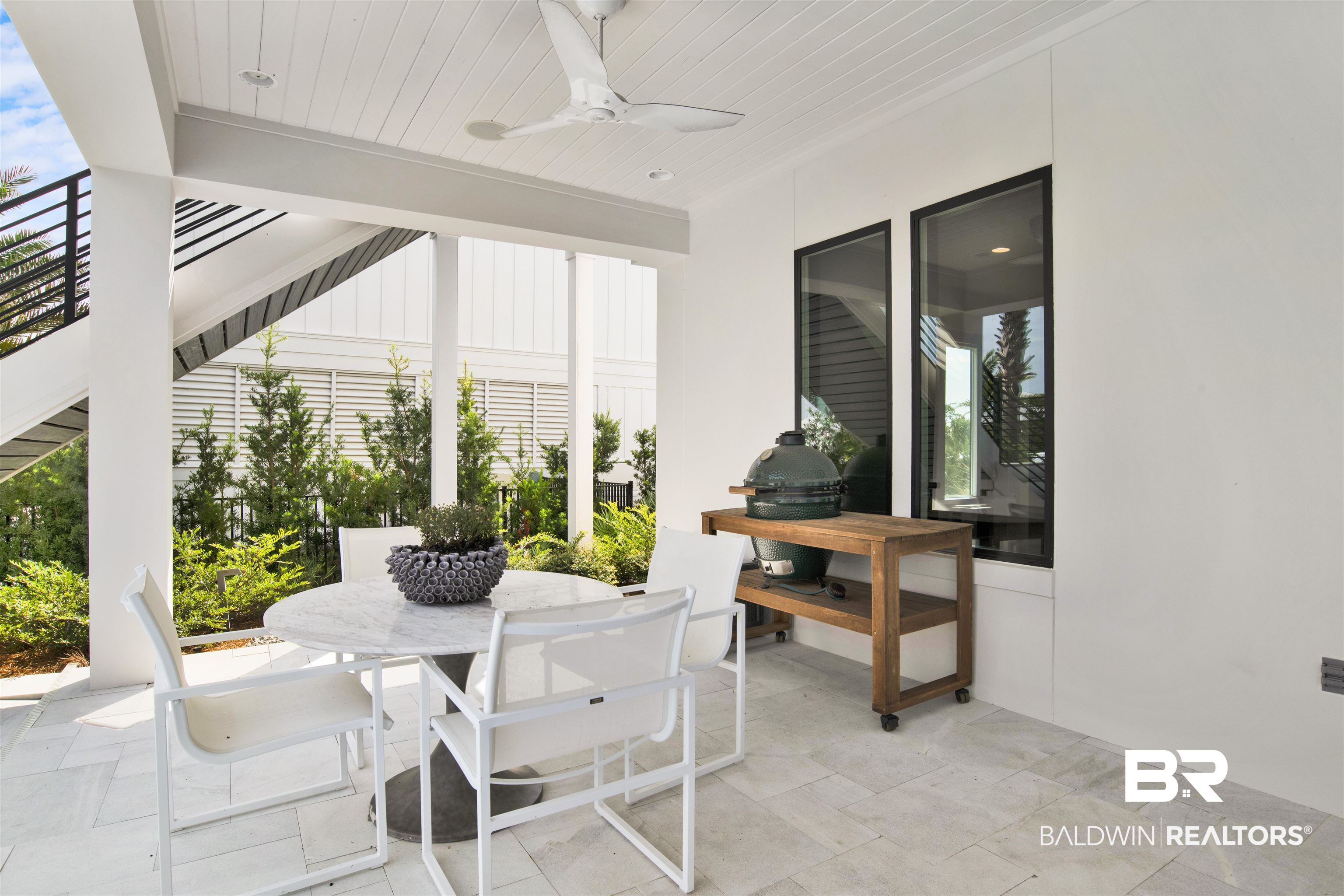 30239 Canal Court Orange Beach, AL 36561 - Photo 58 of 70 View of patio / terrace featuring outdoor dining area, a ceiling fan, and exterior kitchen