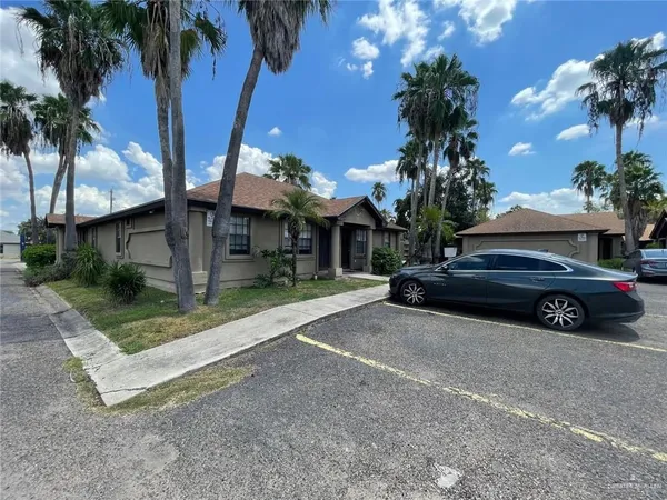 a car parked in front of a house