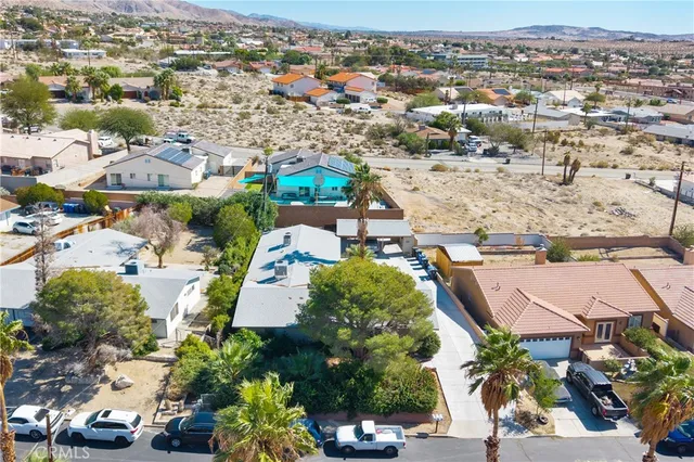 an aerial view of a city with lots of residential buildings