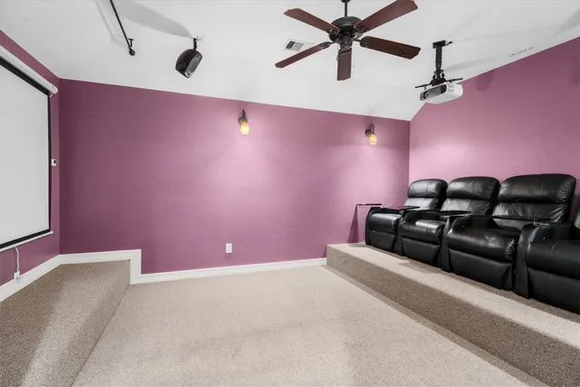 a projector room with a couch