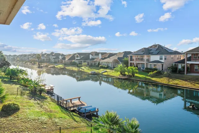 a view of a lake with a house