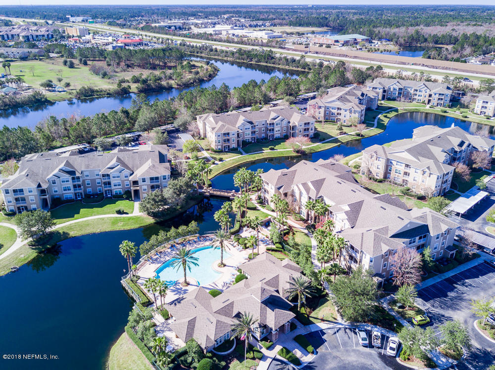 7990 Baymeadows Road East, Unit 211 Jacksonville, FL 32256 - Photo 18 of 21 an aerial view of multiple house