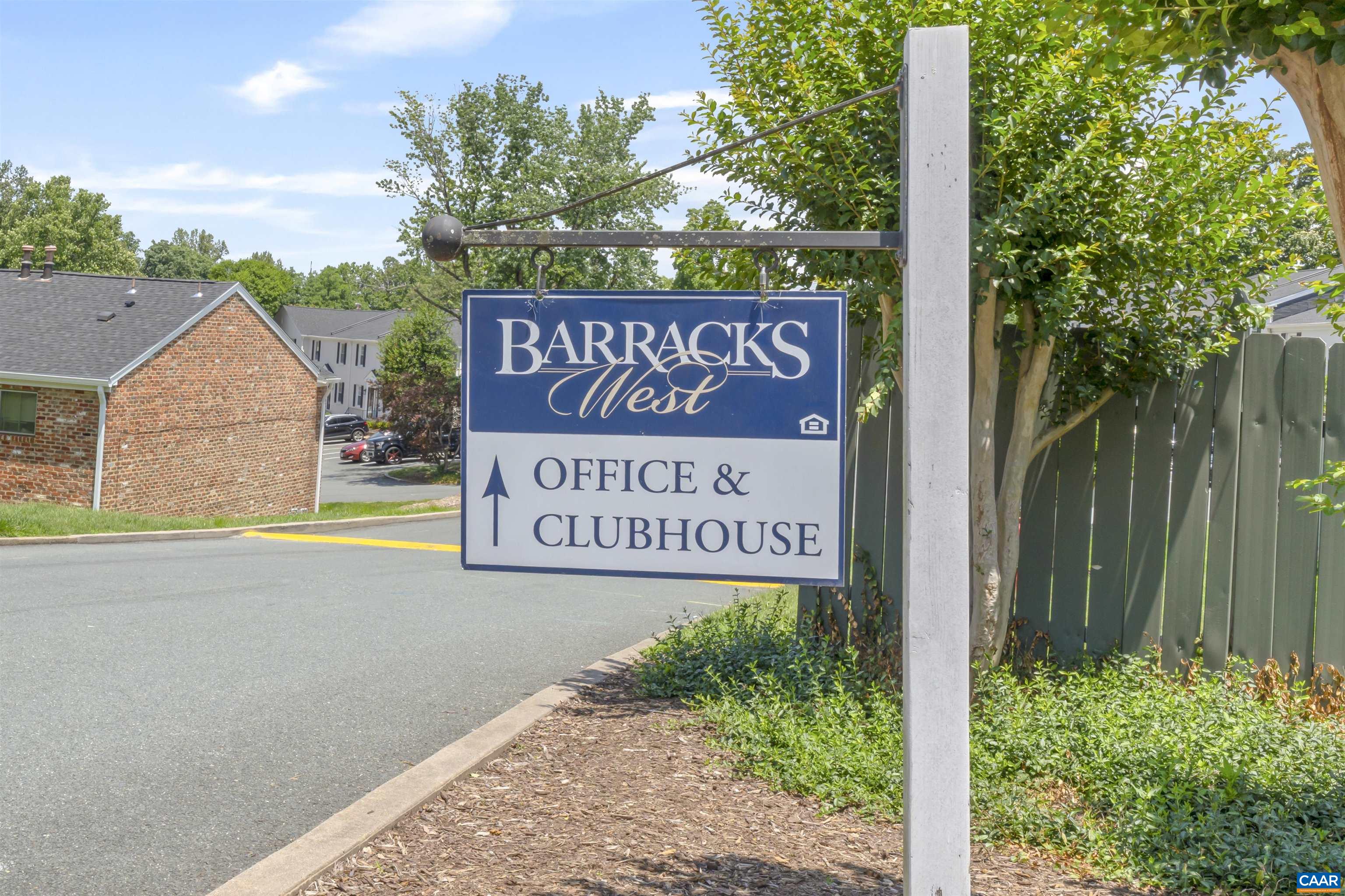 545 Burgoyne Road, Unit 13 Charlottesville, VA 22901 - Photo 2 of 7 a sign that is on the side of a building