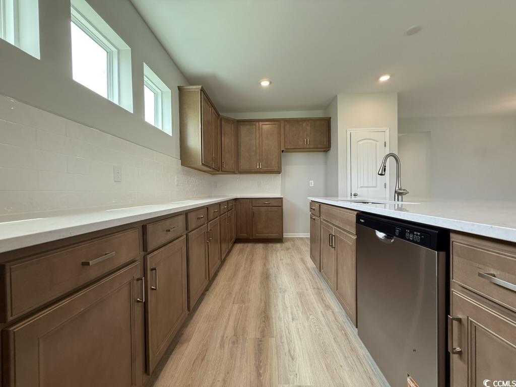 439 Kapalua Loop Little River, SC 29566 - Photo 11 of 36 Kitchen with dishwasher, tasteful backsplash, light wood-style flooring, light countertops, and recessed lighting