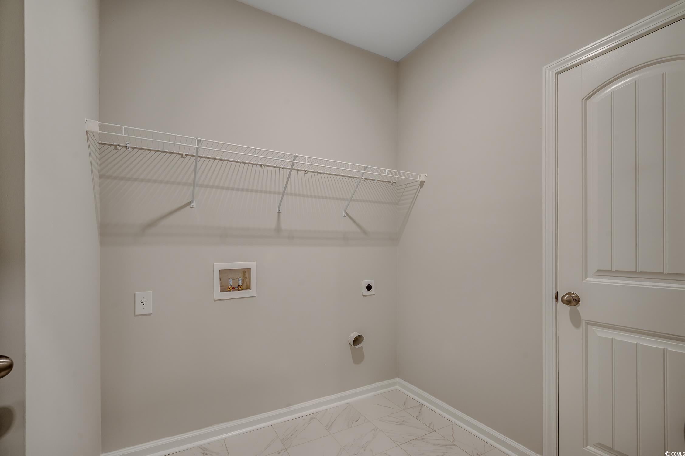 439 Kapalua Loop Little River, SC 29566 - Photo 30 of 36 Washroom featuring hookup for a washing machine, hookup for an electric dryer, and light marble finish flooring