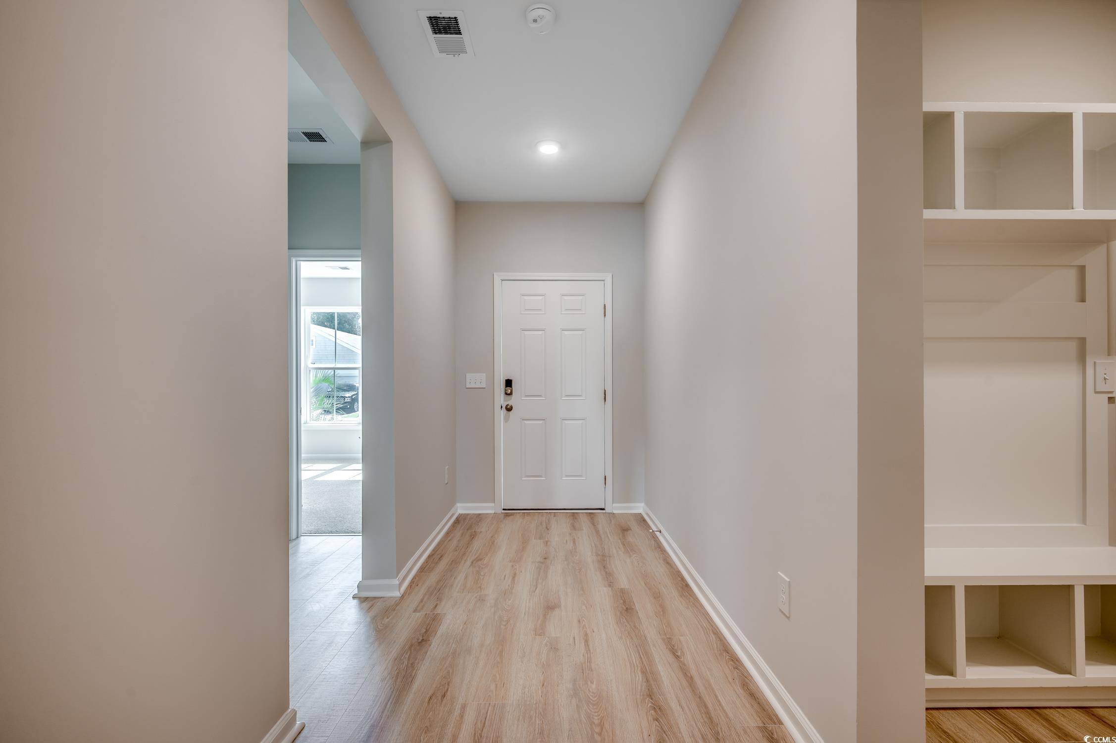 439 Kapalua Loop Little River, SC 29566 - Photo 4 of 36 Hall featuring baseboards and light wood-type flooring