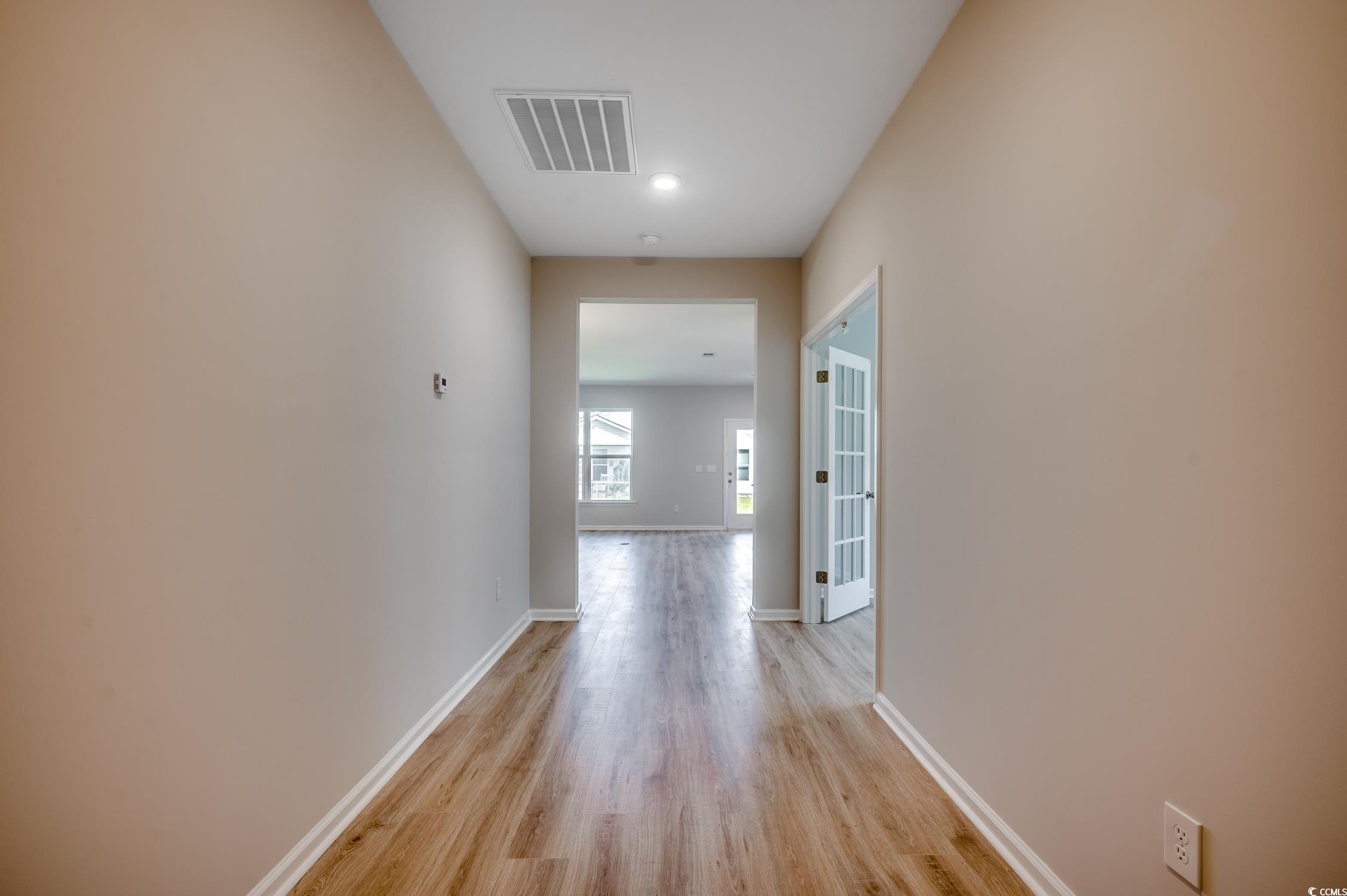 439 Kapalua Loop Little River, SC 29566 - Photo 7 of 36 Hall featuring light wood finished floors and recessed lighting