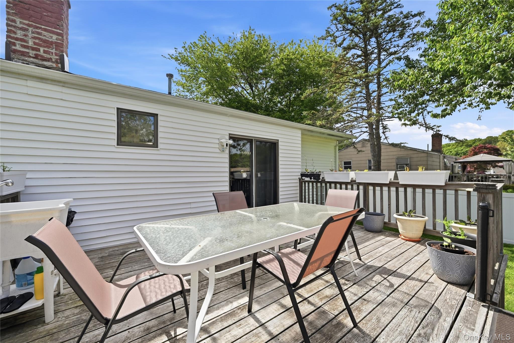 35 Randall Road Shoreham, NY 11786 - Photo 29 of 32 a view of a patio on wooden deck
